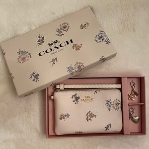 White COACH Wristlet, gift box with 2 charms